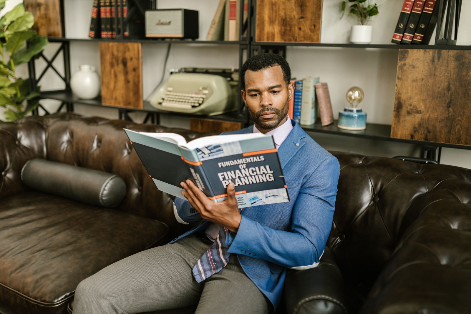 Person reading through financial planning material